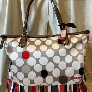 Polka dot coach purse.